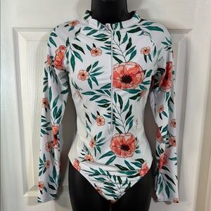 Daci long sleeve one piece swim suit, size large, NWT.